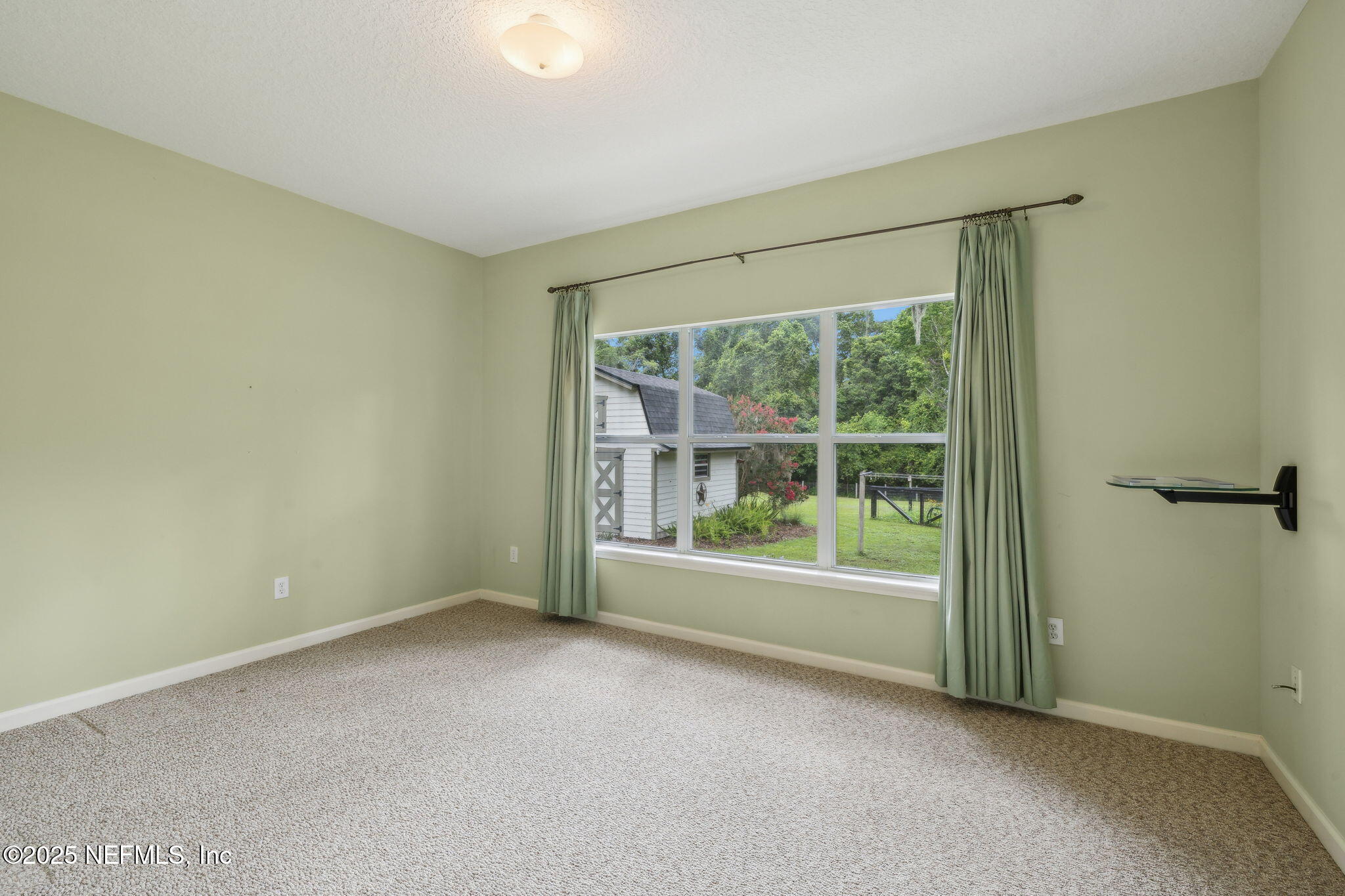 5802 Manning Cemetery Road Jacksonville, FL 32234 - Photo 46 of 117 Bedroom 3 with Door to Rear Porch