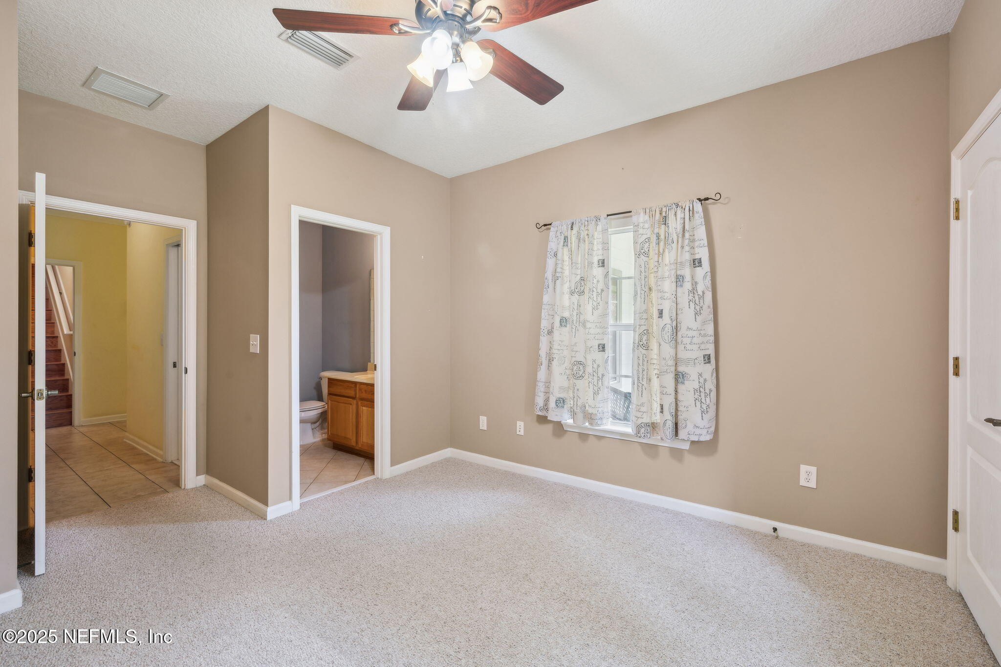5802 Manning Cemetery Road Jacksonville, FL 32234 - Photo 49 of 117 an empty room with windows and closet