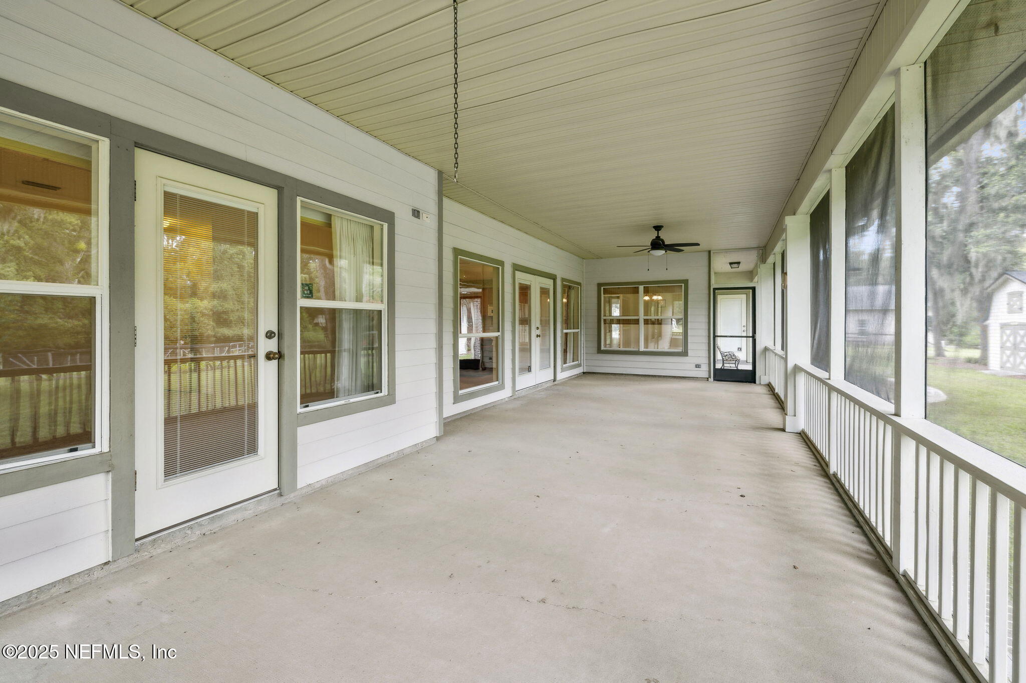 5802 Manning Cemetery Road Jacksonville, FL 32234 - Photo 60 of 117 a view of a big room with windows