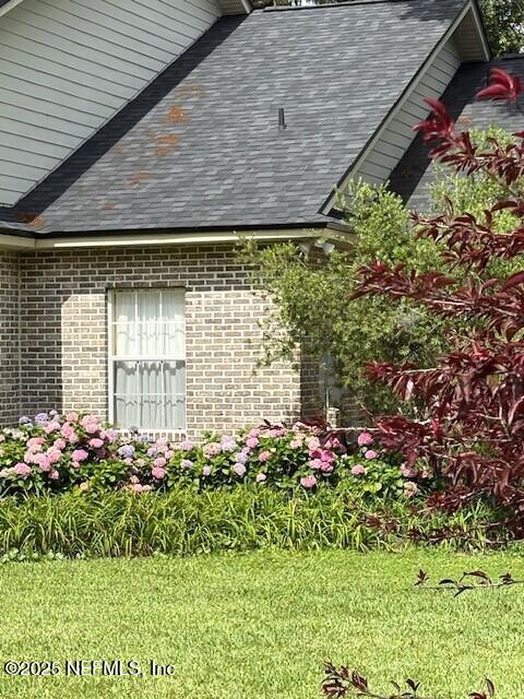 5802 Manning Cemetery Road Jacksonville, FL 32234 - Photo 100 of 117 a yellow building with garden in front of it
