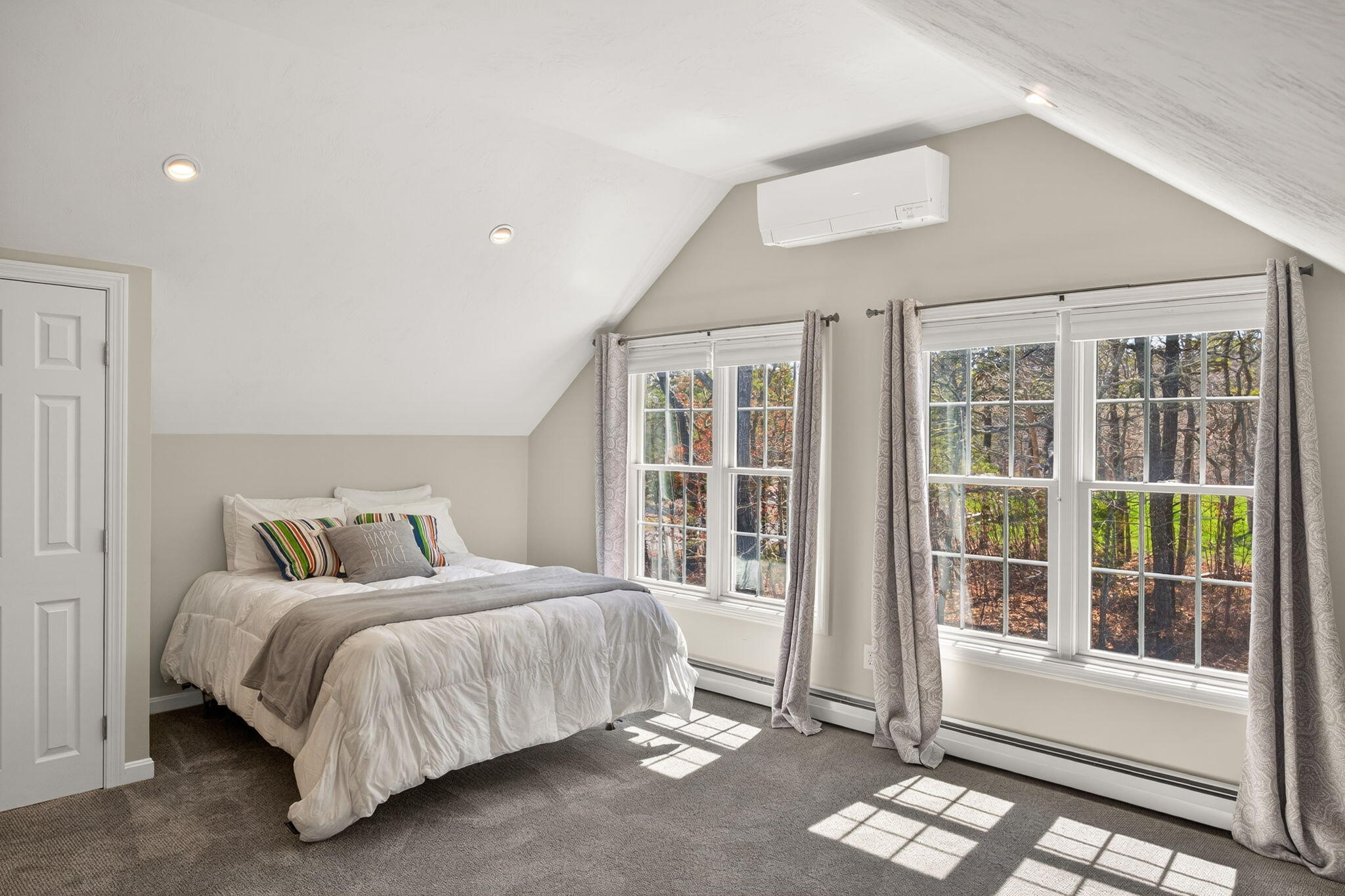 23 Dundee Circle Harwich, MA 02645 - Photo 19 of 33 a bedroom with a bed and a large window