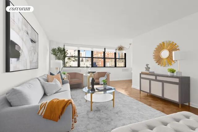 a living room with furniture and a window