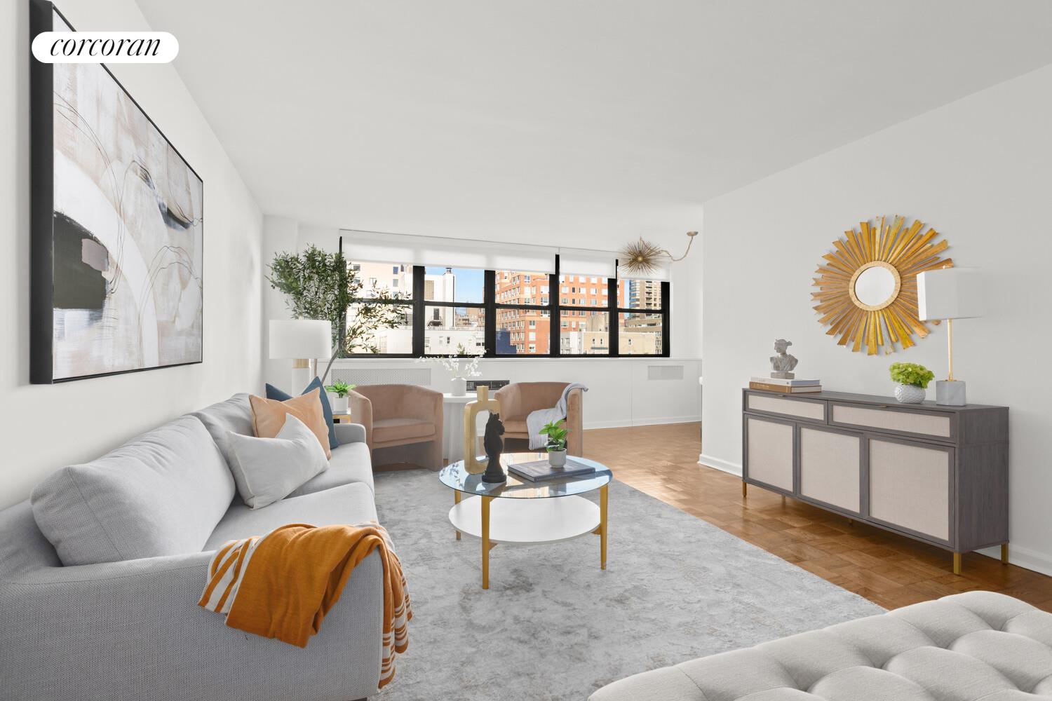 a living room with furniture and a window