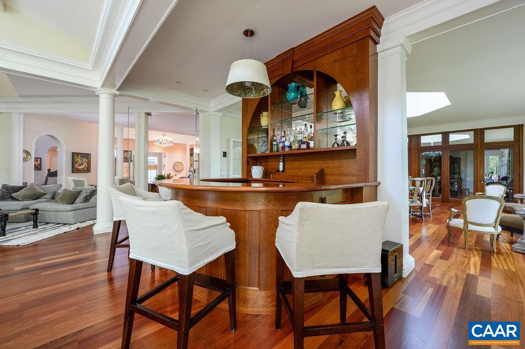 2408 Old Lynchburg Road Charlottesville, VA 22903 - Photo 16 of 71 a view of a dining room with furniture and wooden floor