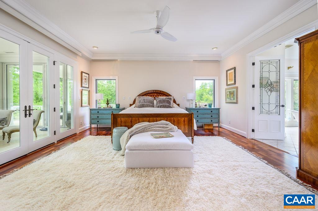 2408 Old Lynchburg Road Charlottesville, VA 22903 - Photo 27 of 71 a living room with a couch and a gate