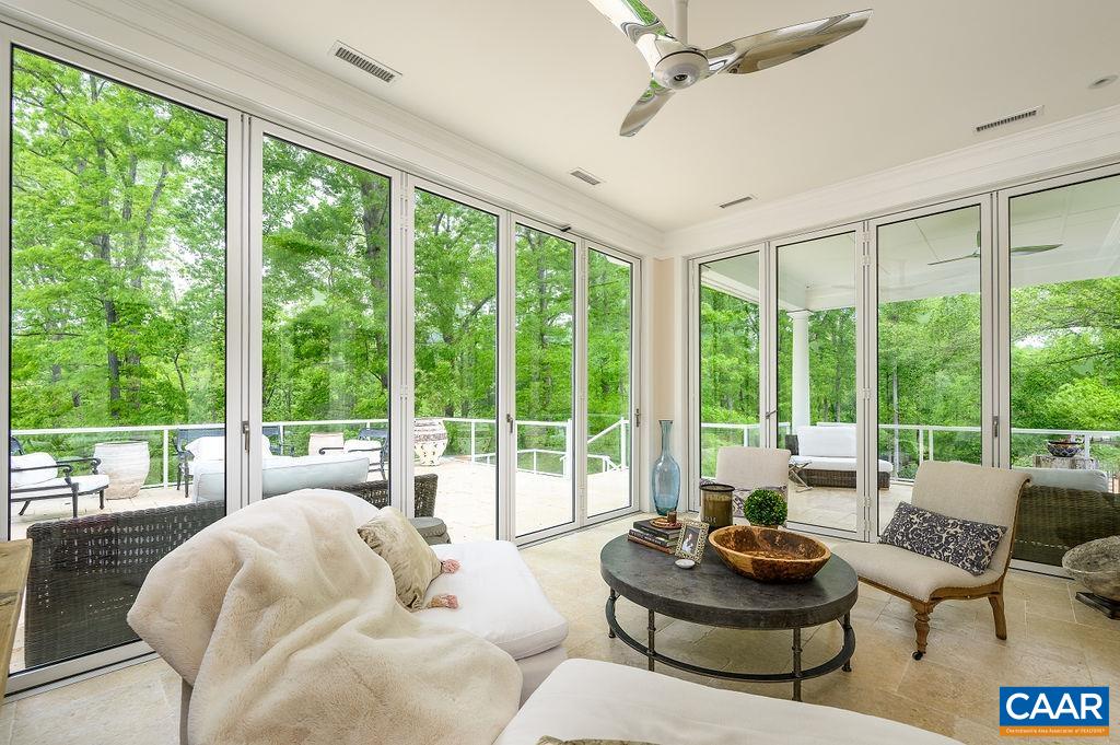 2408 Old Lynchburg Road Charlottesville, VA 22903 - Photo 33 of 71 a living room with furniture and a large window