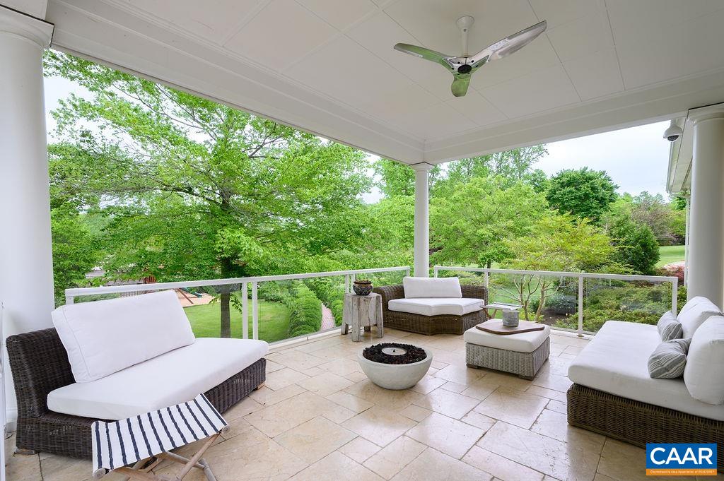 2408 Old Lynchburg Road Charlottesville, VA 22903 - Photo 35 of 71 a view of a patio with couches chairs and a potted plant
