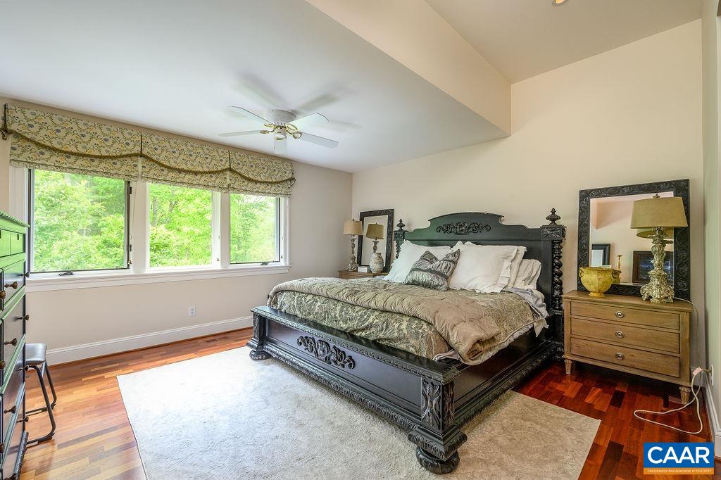 2408 Old Lynchburg Road Charlottesville, VA 22903 - Photo 37 of 71 a bedroom with a large bed and a large window