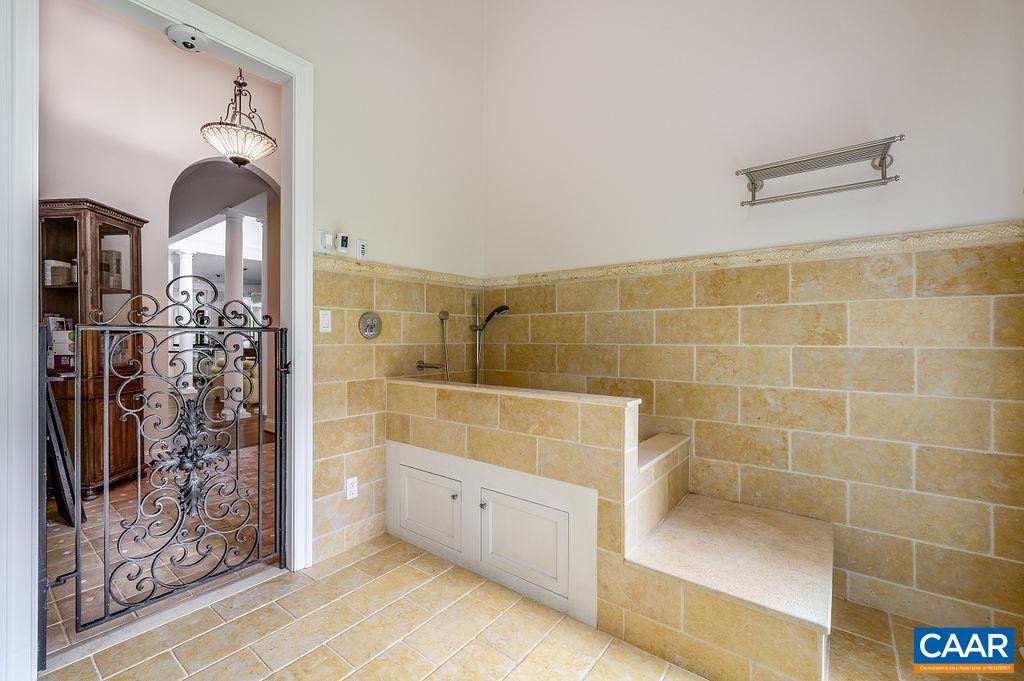 2408 Old Lynchburg Road Charlottesville, VA 22903 - Photo 40 of 71 a bathroom with a bathtub and shower