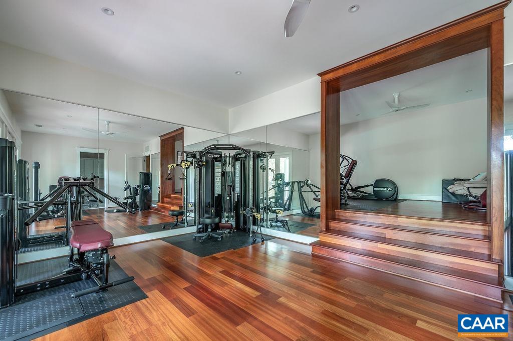 2408 Old Lynchburg Road Charlottesville, VA 22903 - Photo 51 of 71 a living room filled with furniture and a table