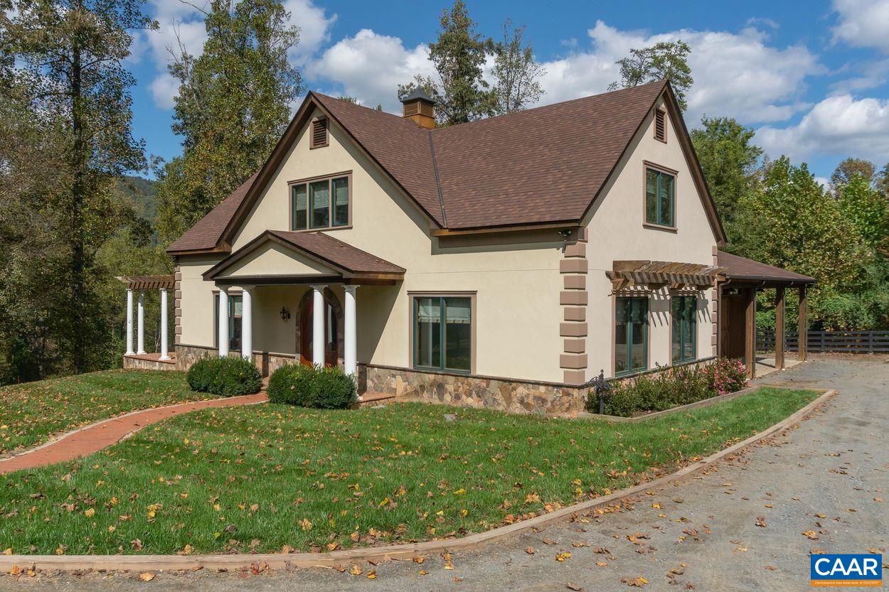 2408 Old Lynchburg Road Charlottesville, VA 22903 - Photo 59 of 71 a front view of a house with garden