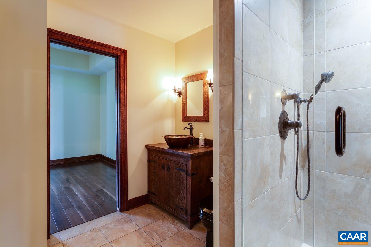 2408 Old Lynchburg Road Charlottesville, VA 22903 - Photo 64 of 71 a view of a bathroom from a hallway