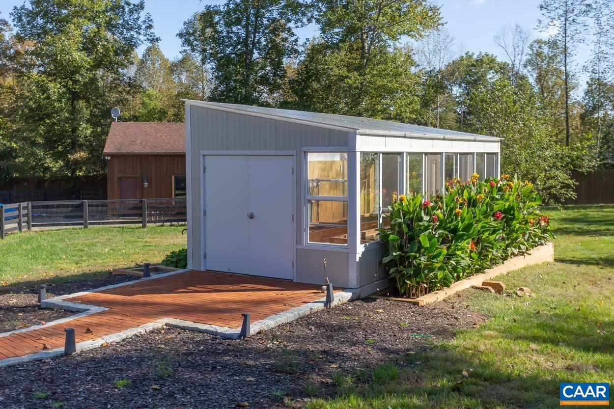 2408 Old Lynchburg Road Charlottesville, VA 22903 - Photo 67 of 71 a view of a house with backyard and garden