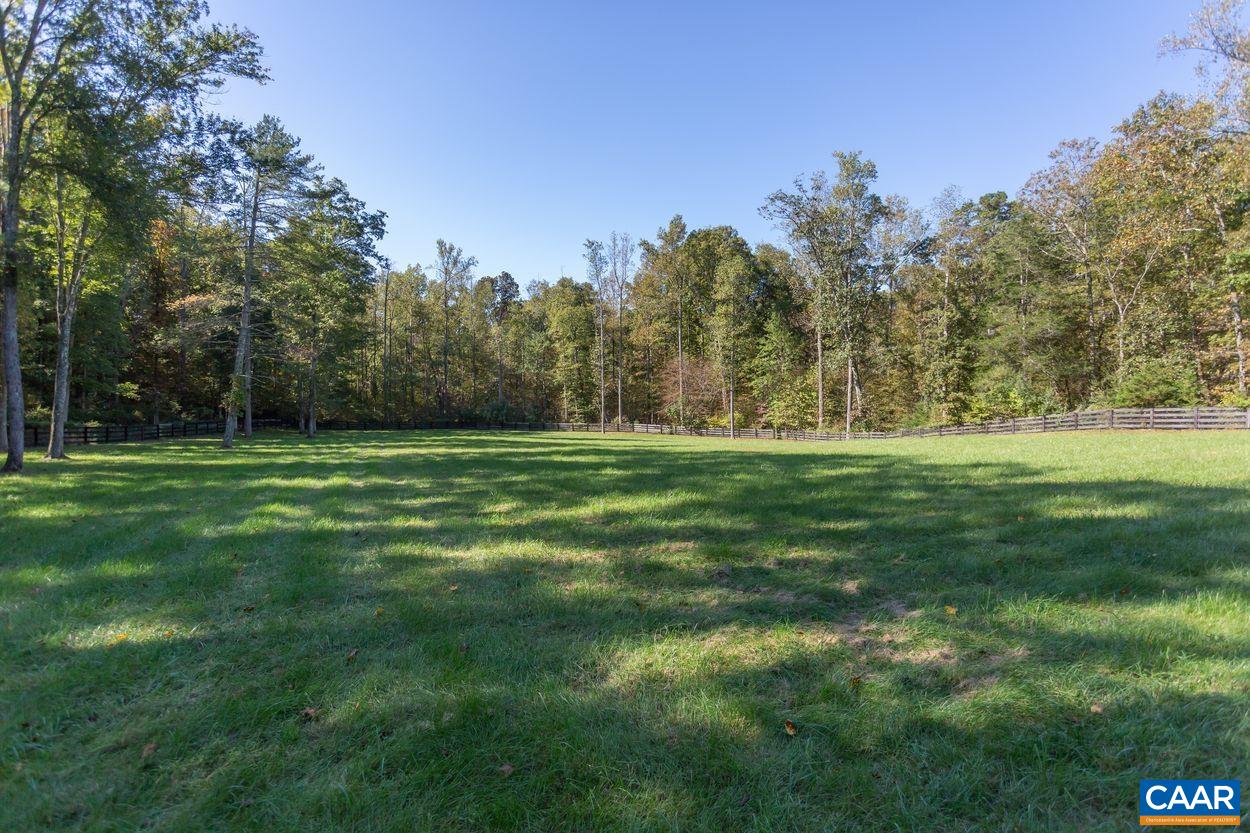 2408 Old Lynchburg Road Charlottesville, VA 22903 - Photo 68 of 71 a big yard with lots of green space and trees all around