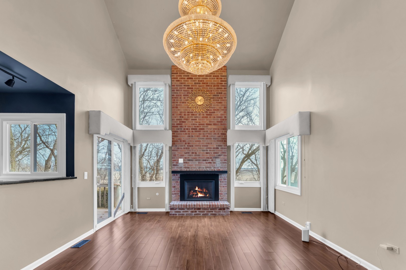 6063 Morningside Court Gurnee, IL 60031 - Photo 14 of 58 a view of an empty room with wooden floor and a window