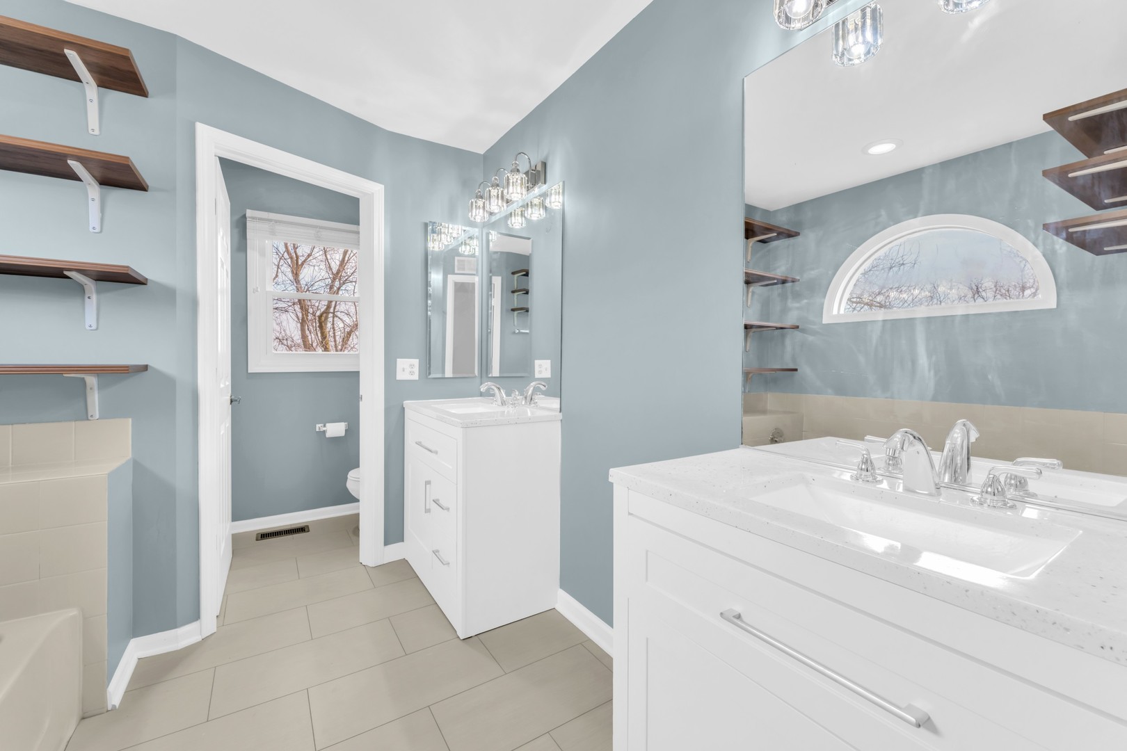 6063 Morningside Court Gurnee, IL 60031 - Photo 24 of 58 a bathroom with a sink and a mirror