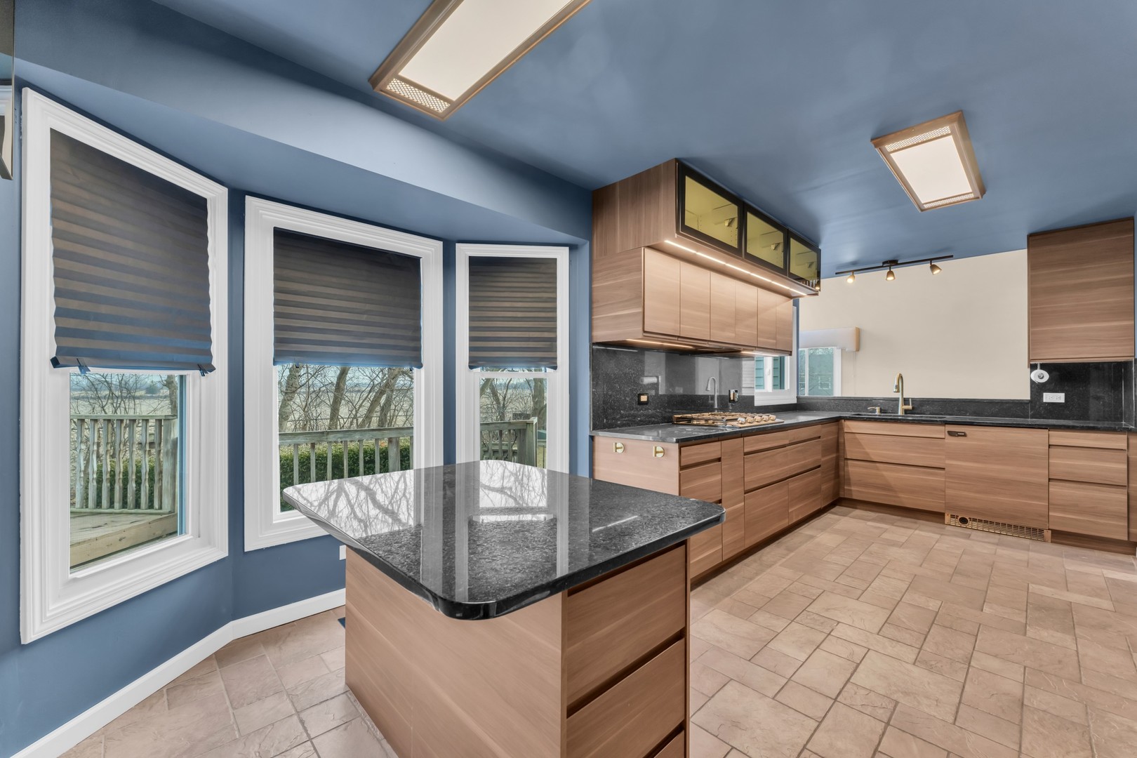 6063 Morningside Court Gurnee, IL 60031 - Photo 9 of 58 a kitchen with stainless steel appliances granite countertop a stove and a sink
