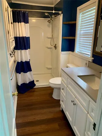 a bathroom with a sink and a shower