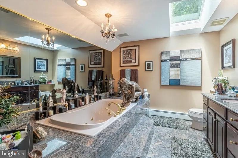 12 Upper Lake Road Oak Ridge, NJ 07438 - Photo 20 of 25 a view of a living room and kitchen