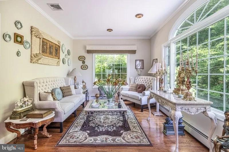 12 Upper Lake Road Oak Ridge, NJ 07438 - Photo 8 of 25 a living room with furniture and a large window