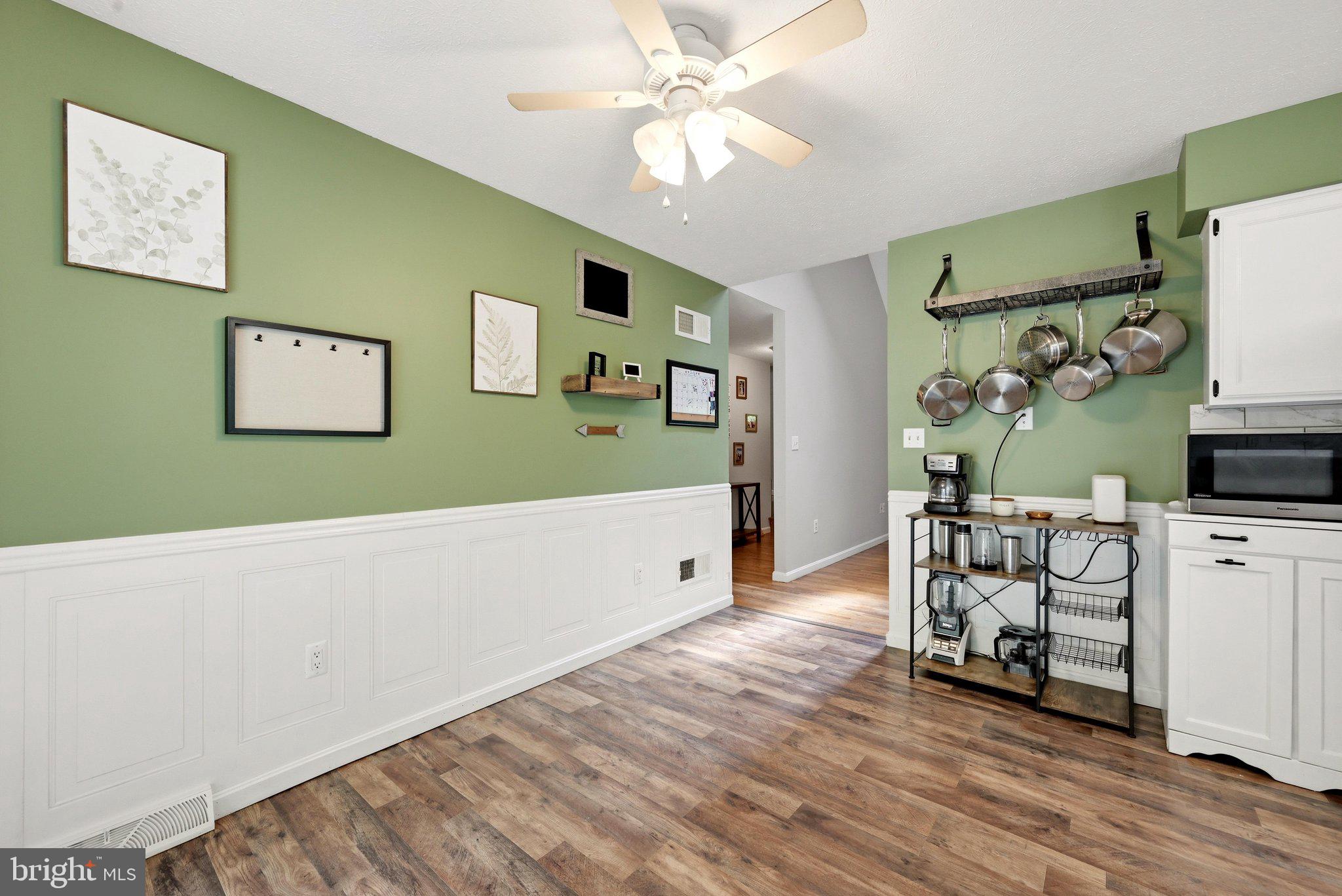 150 Holiday Road Cross Junction, VA 22625 - Photo 22 of 97 Wainscotting, ceiling fan & LVP flooring