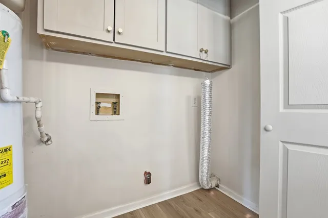 a view of a storage & utility room with closet
