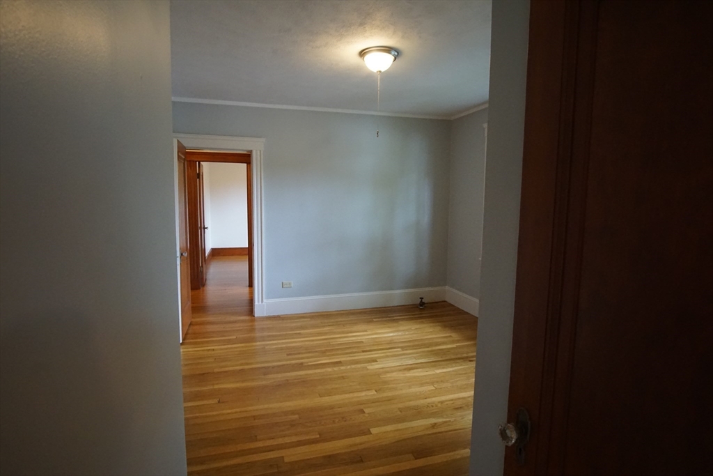 754 Massachusetts Avenue, Unit 1 Lexington, MA 02421 - Photo 15 of 17 a view of an empty room and window