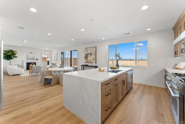 a bedroom with a bed furniture and a large window