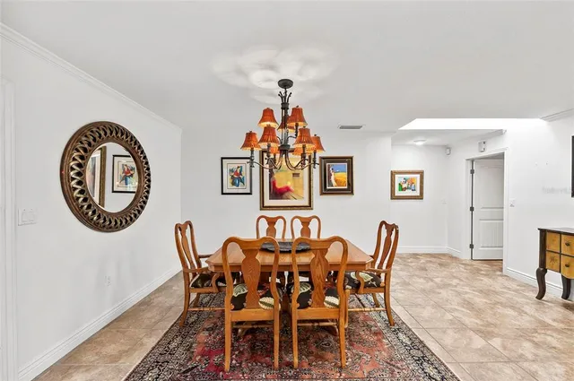 a view of a kitchen with furniture and a window