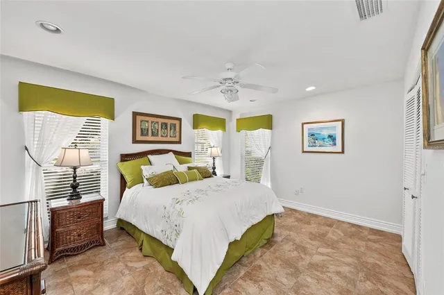 a view of a dining room with furniture and a window