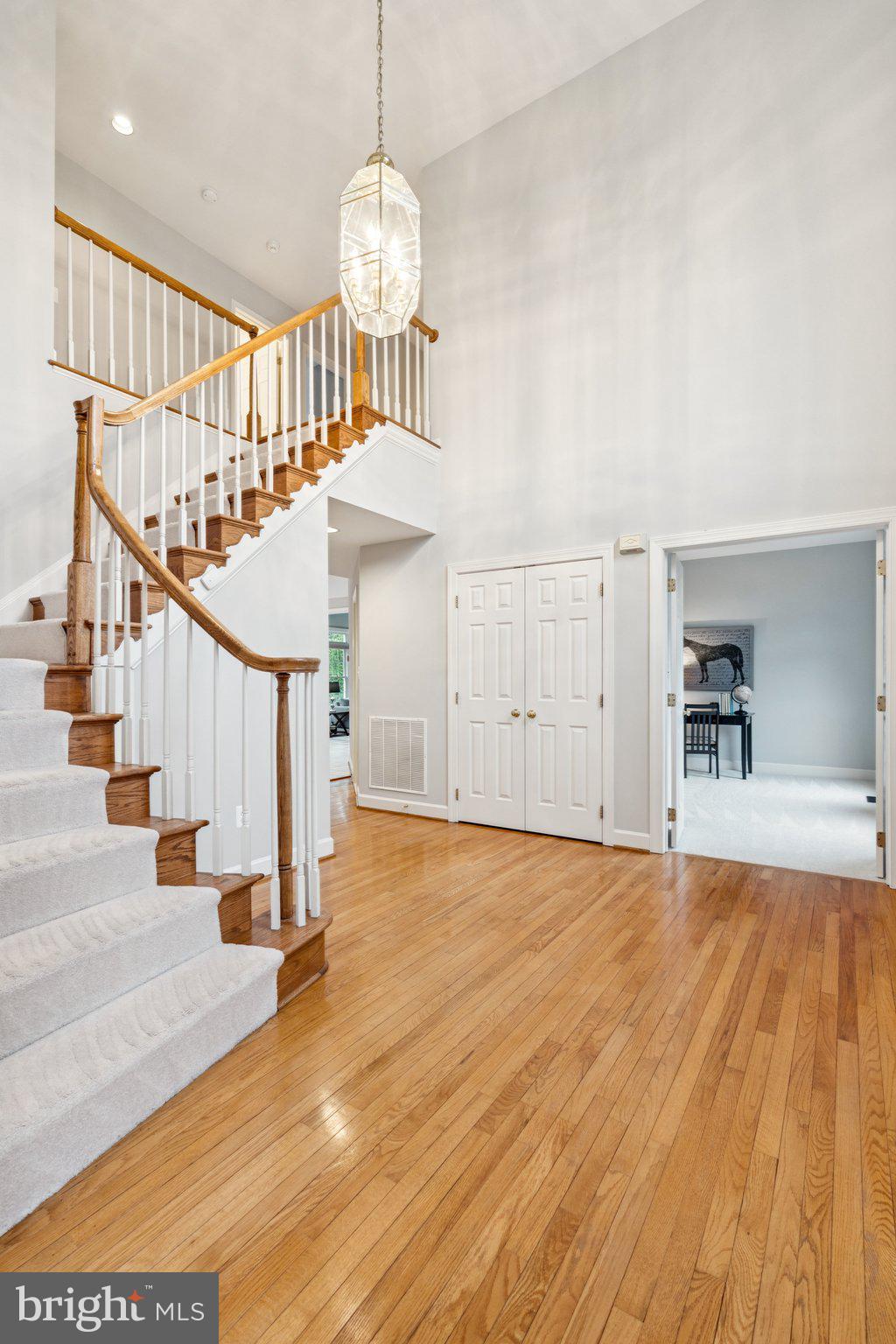 12213 Windsor Hall Way Herndon, VA 20170 - Photo 43 of 64 a view of empty room with wooden floor