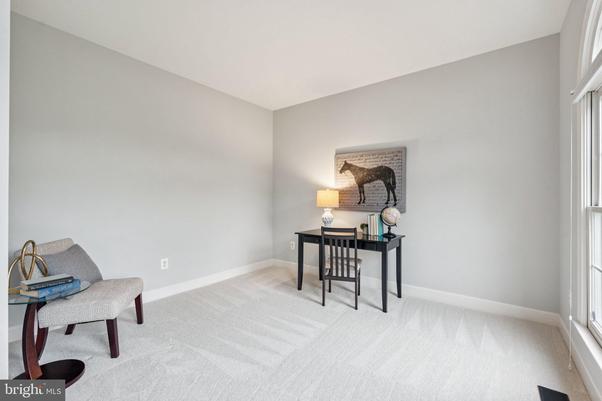 12213 Windsor Hall Way Herndon, VA 20170 - Photo 44 of 64 a workspace with a table chair and a window