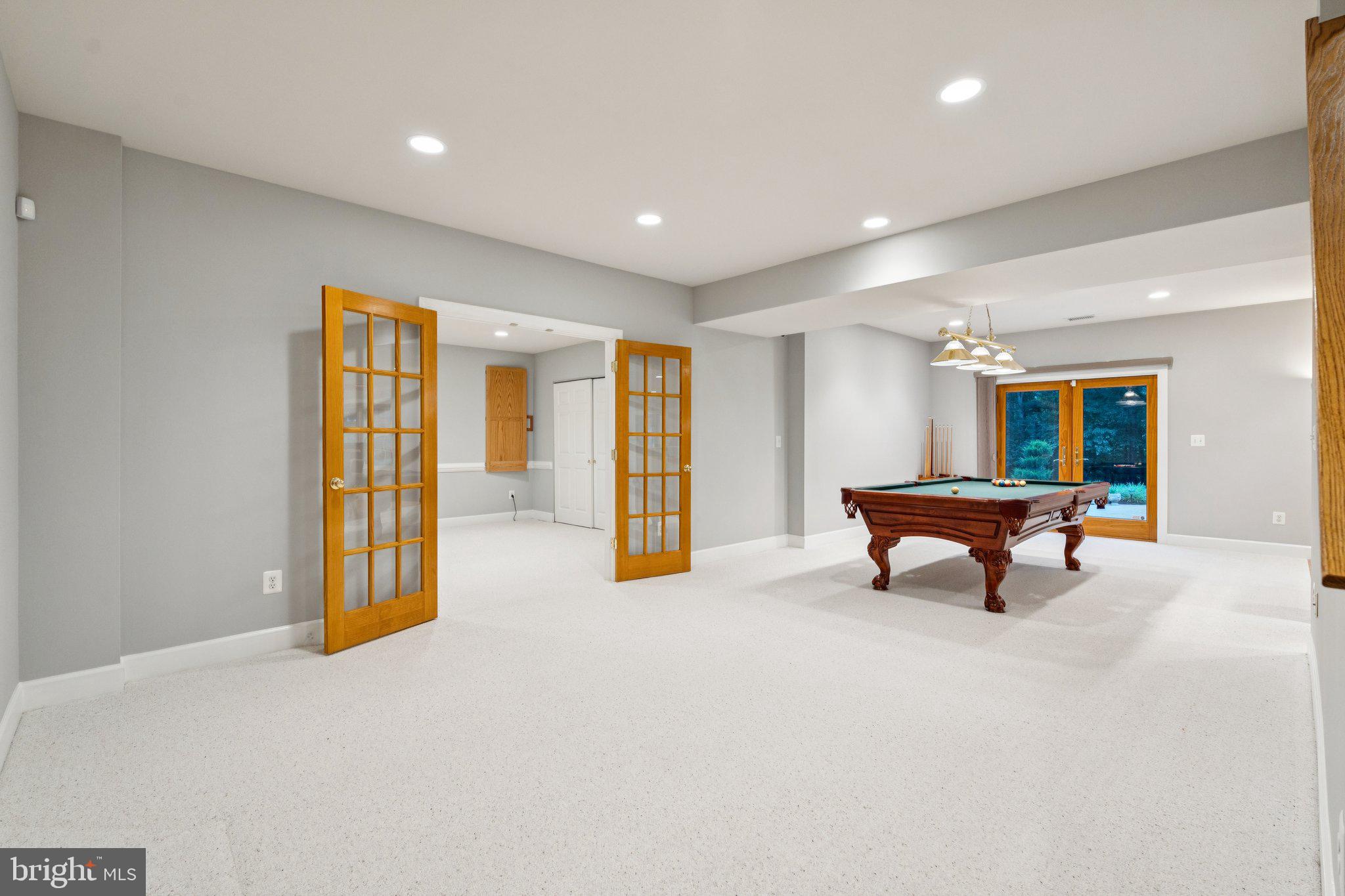 12213 Windsor Hall Way Herndon, VA 20170 - Photo 47 of 64 a building with pool table and windows