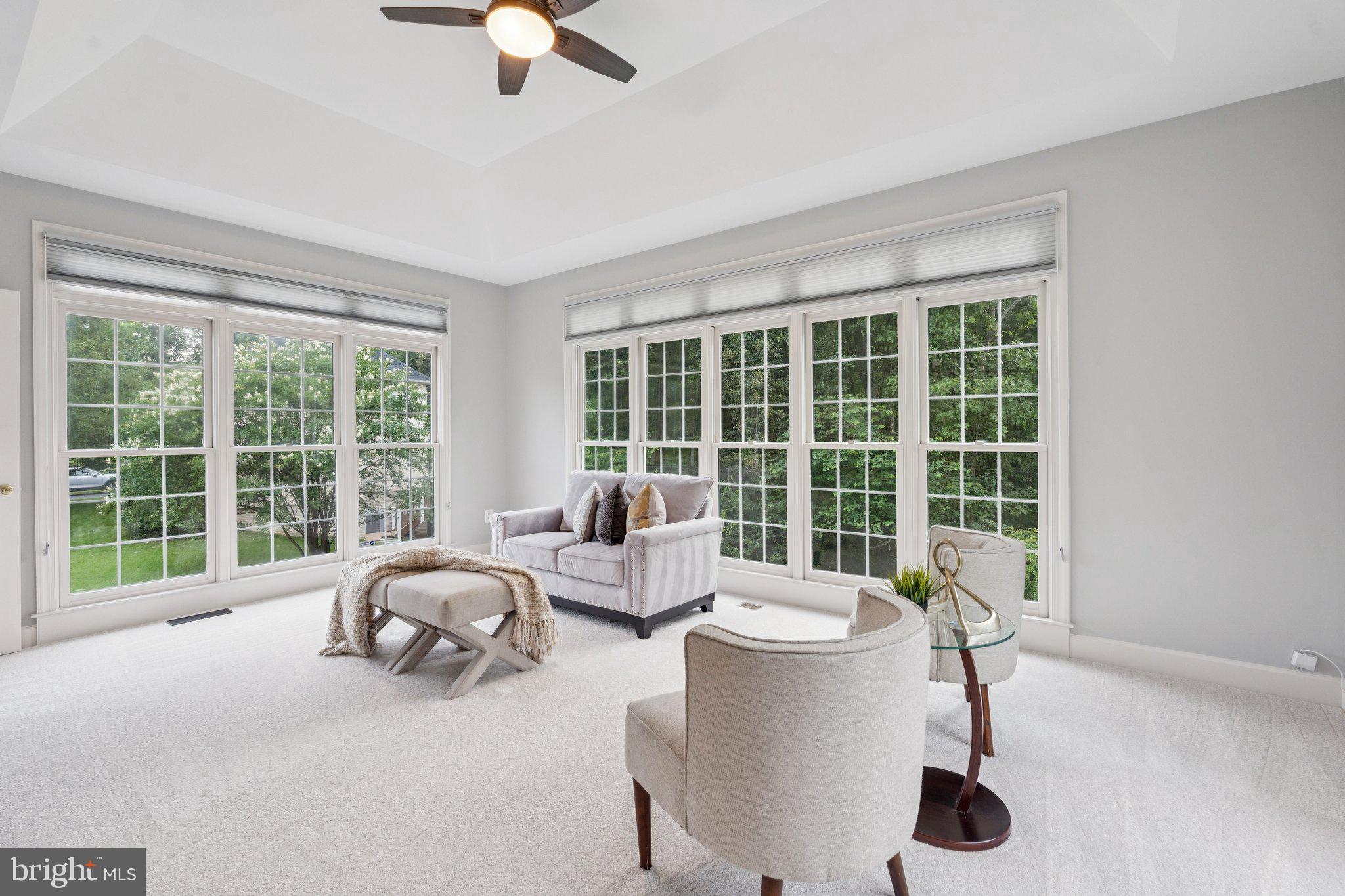 12213 Windsor Hall Way Herndon, VA 20170 - Photo 10 of 64 a living room with furniture and a large window