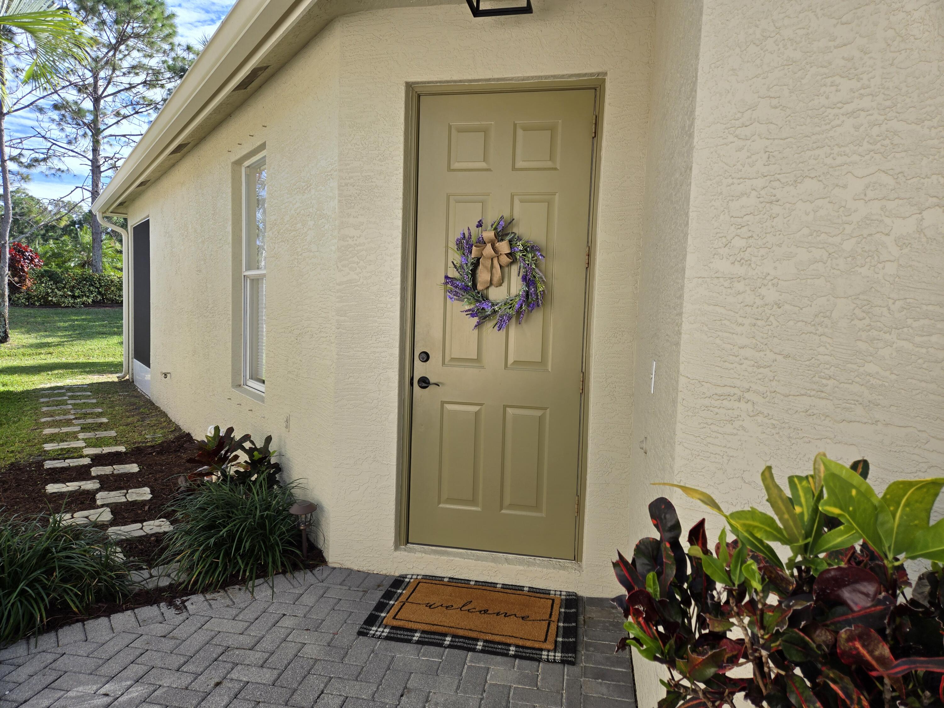 327 Southwest Coconut Key Way Port St. Lucie, FL 34986 - Photo 6 of 65 20250115_140413