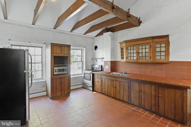 a view of a livingroom with wooden floor