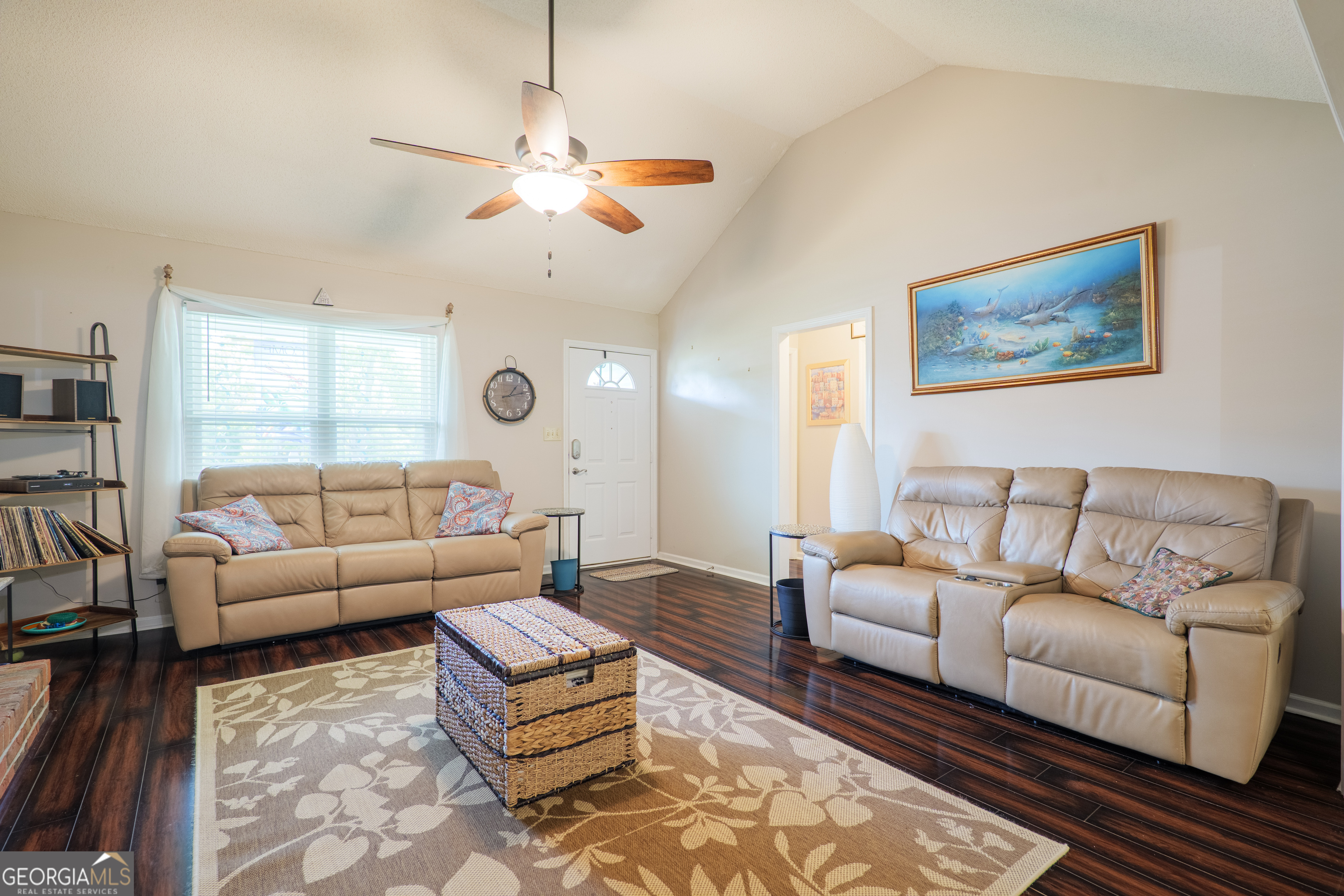 3937 Studstill Road Valdosta, GA 31605 - Photo 8 of 29 a living room with furniture a rug and a large window