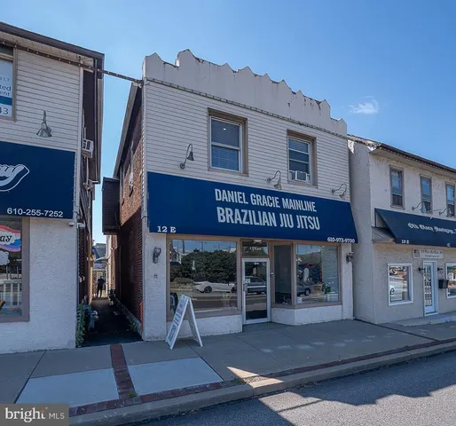 a view of a building with sitting area
