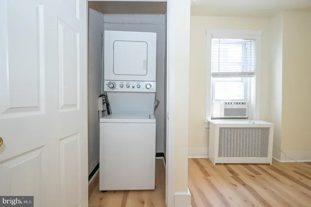 a view of livingroom with washer and dryer