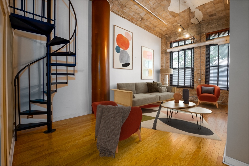 801 South Wells Street, Unit 102 Chicago, IL 60607 - Photo 13 of 26 a living room with furniture
