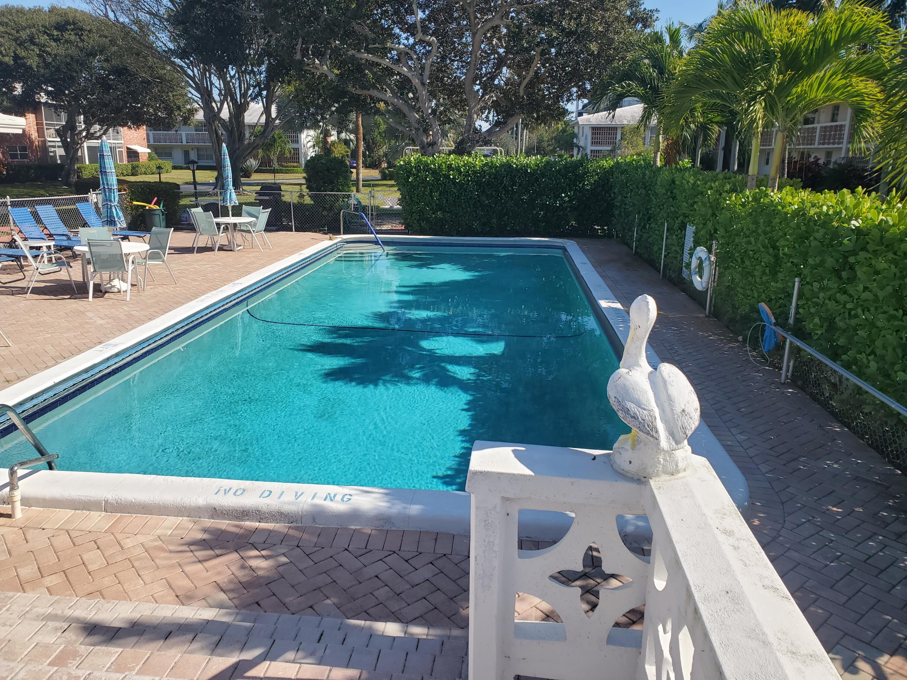 20 Southeast 13th Street, Unit A6 Boca Raton, FL 33432 - Photo 14 of 14 a view of backyard with sitting area