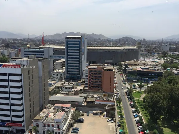 a bathroom with a toilet and shower