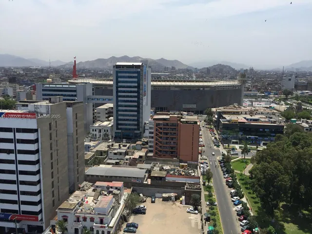 a bathroom with a toilet and shower