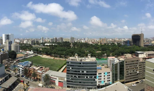 a workspace with furniture and window