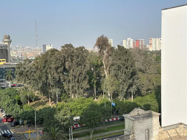 an empty room with a large window