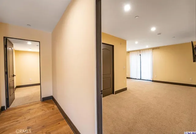 a view of hallway with a large window