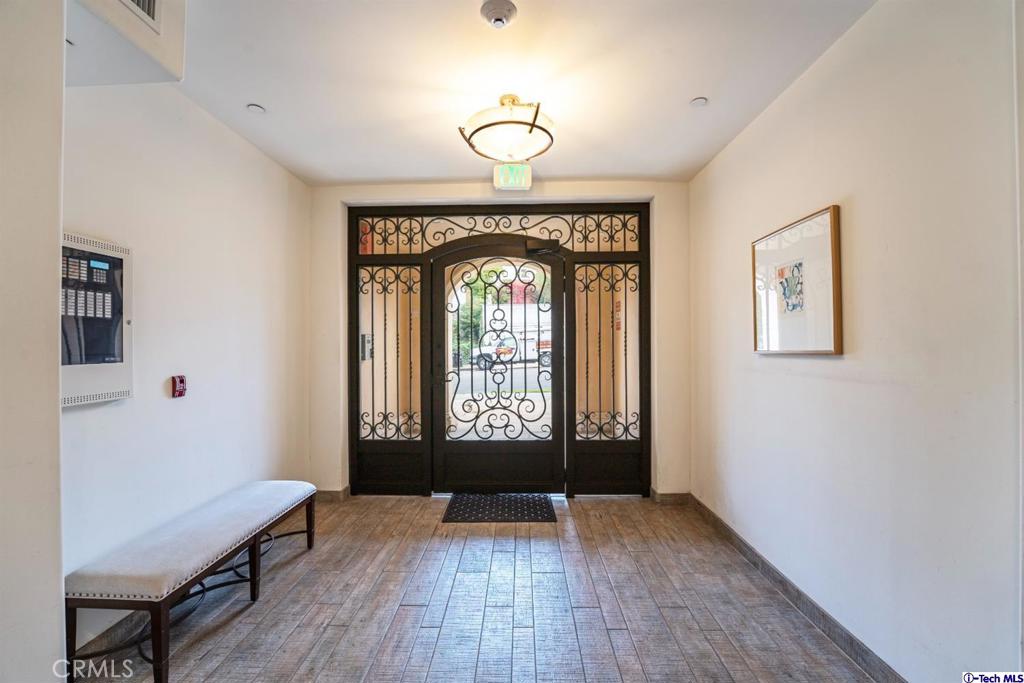 10523 Ashton Avenue, Unit 202 Los Angeles, CA 90024 - Photo 4 of 36 a view of entryway with wooden floor