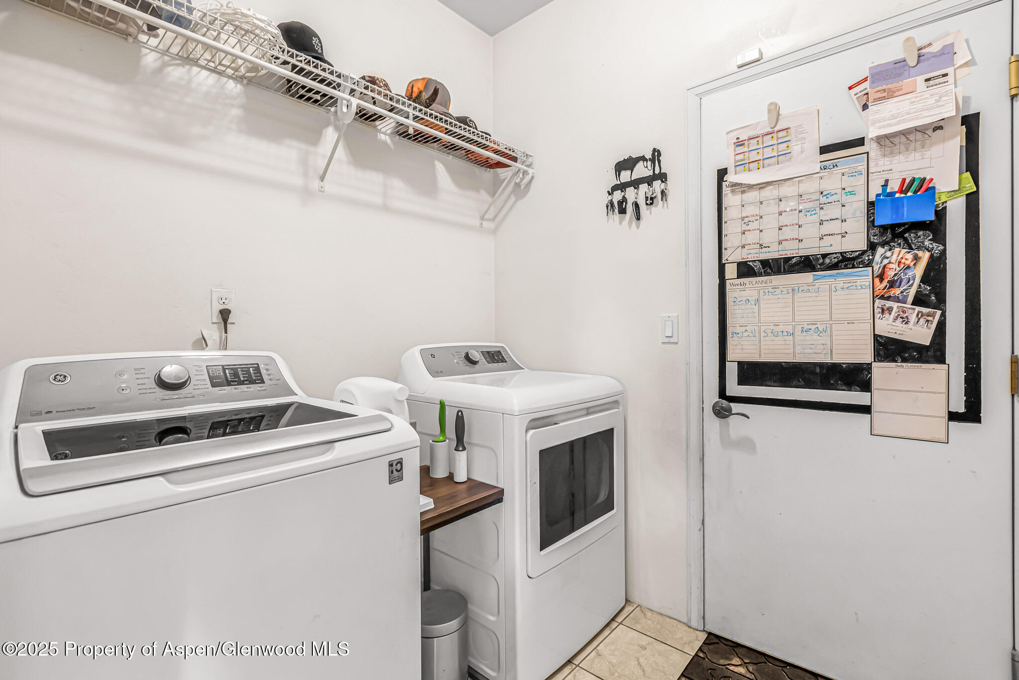 1357 West Spruce Court Rifle, CO 81650 - Photo 14 of 38 a utility room with dryer and washer
