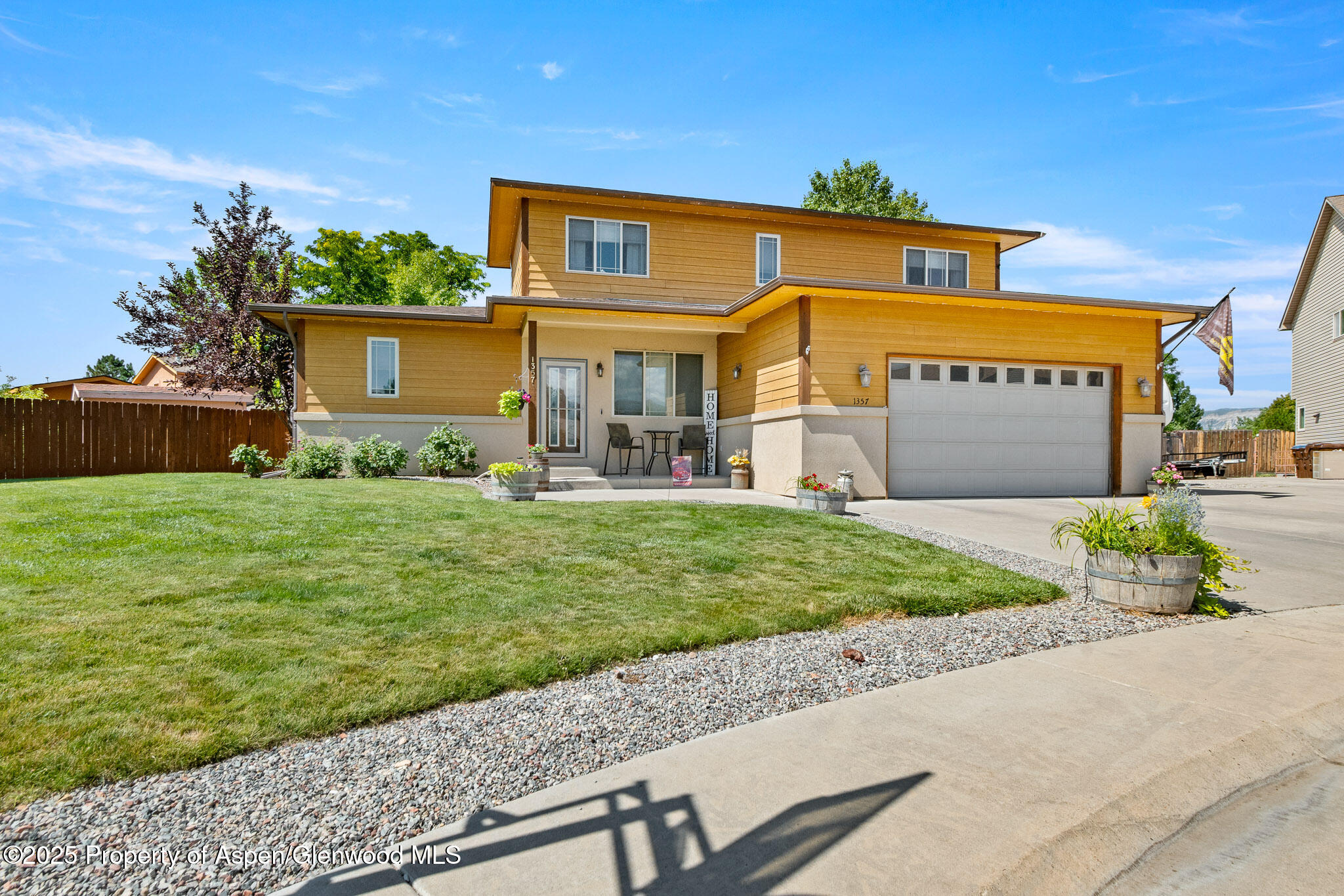 1357 West Spruce Court Rifle, CO 81650 - Photo 2 of 38 a view of a house with a yard