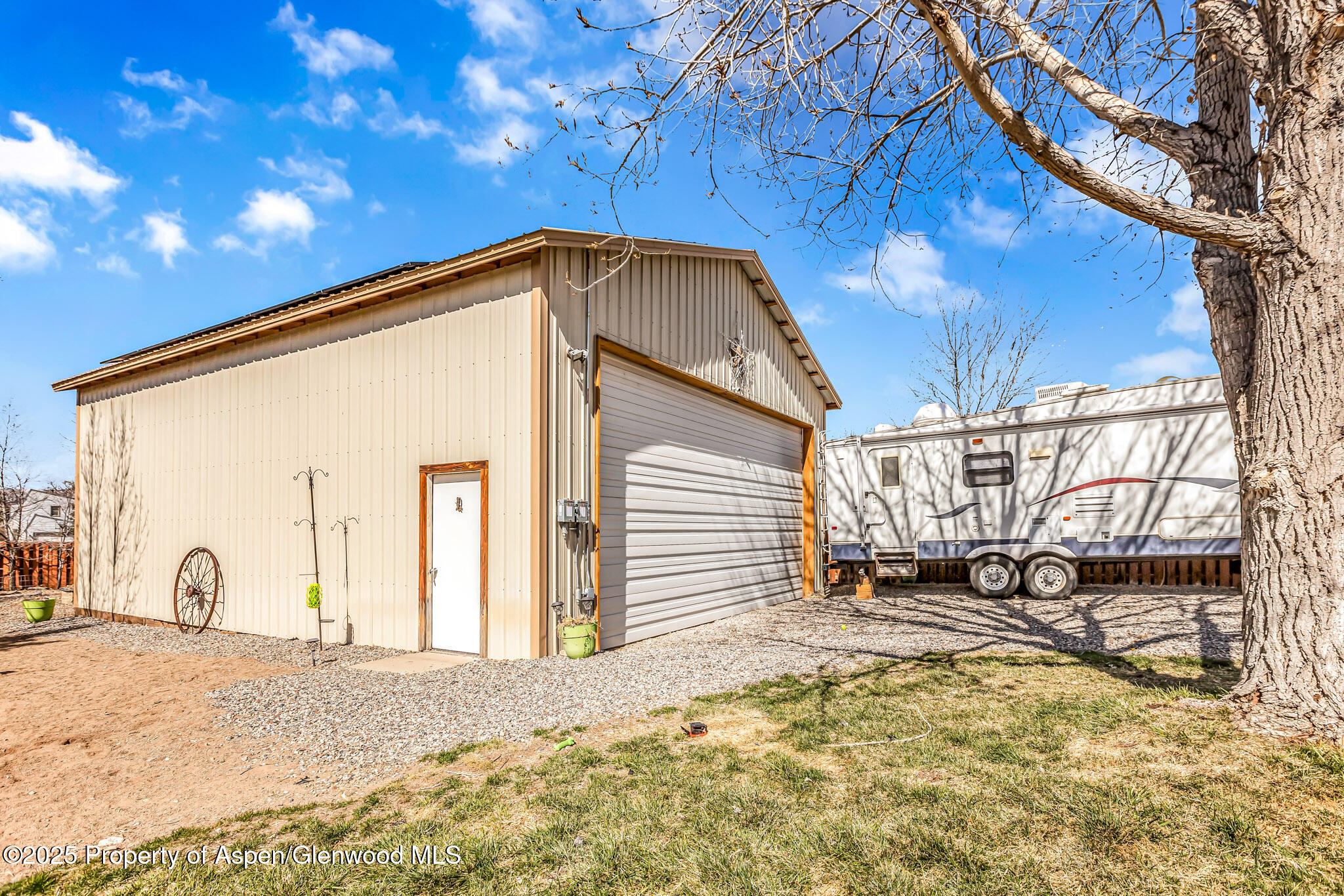 1357 West Spruce Court Rifle, CO 81650 - Photo 32 of 38 front view of a house with a yard